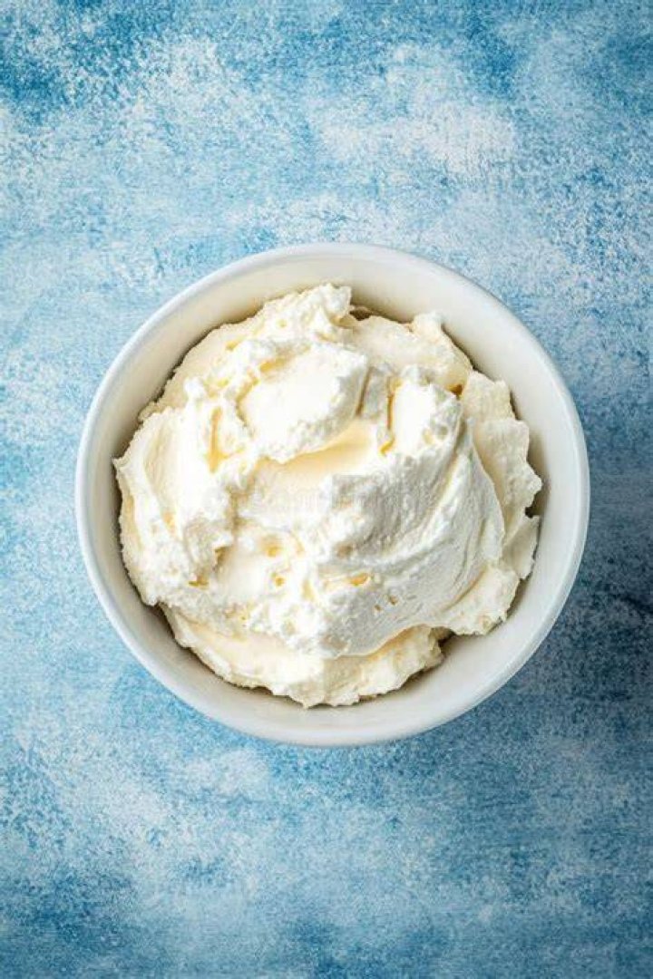 Bowl of cream cheese frosting.