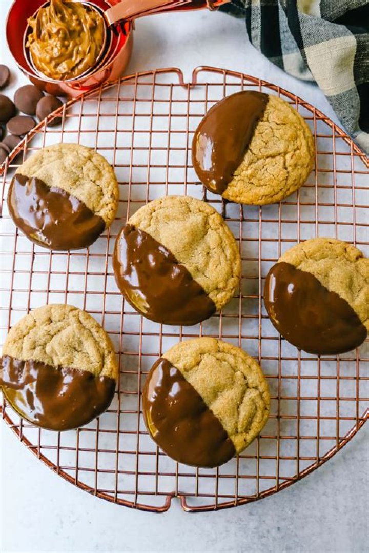 Chocolate cookies dipped in melted white chocolate.