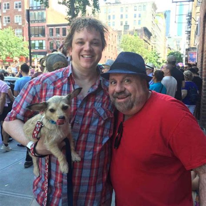 Eric Millegan with his Husband Charles Michel.