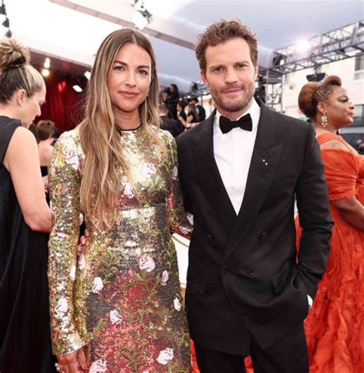 Image of Amelia Warner and Jamie Dornan attending a public event together