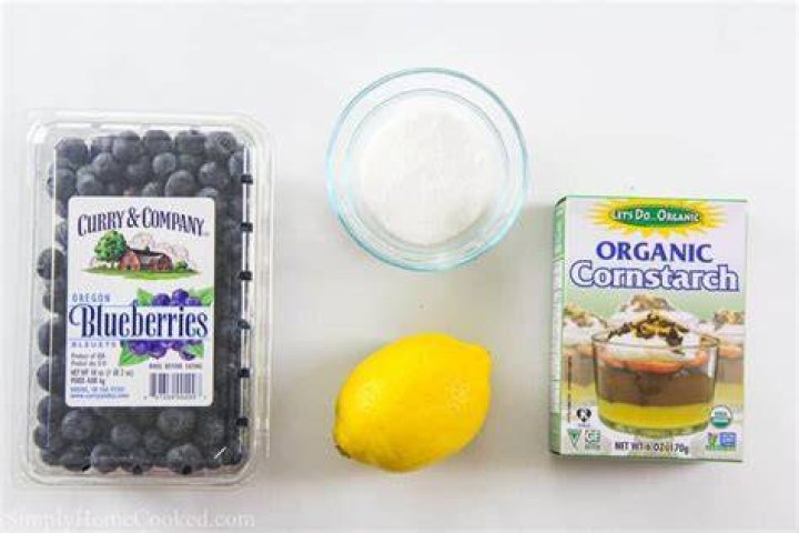 Ingredients for blueberry pie filling: blueberries, cornstarch, juice, sugar, lemon.