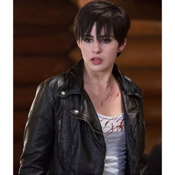 Jacqueline Toboni all in black at a snowy hill.