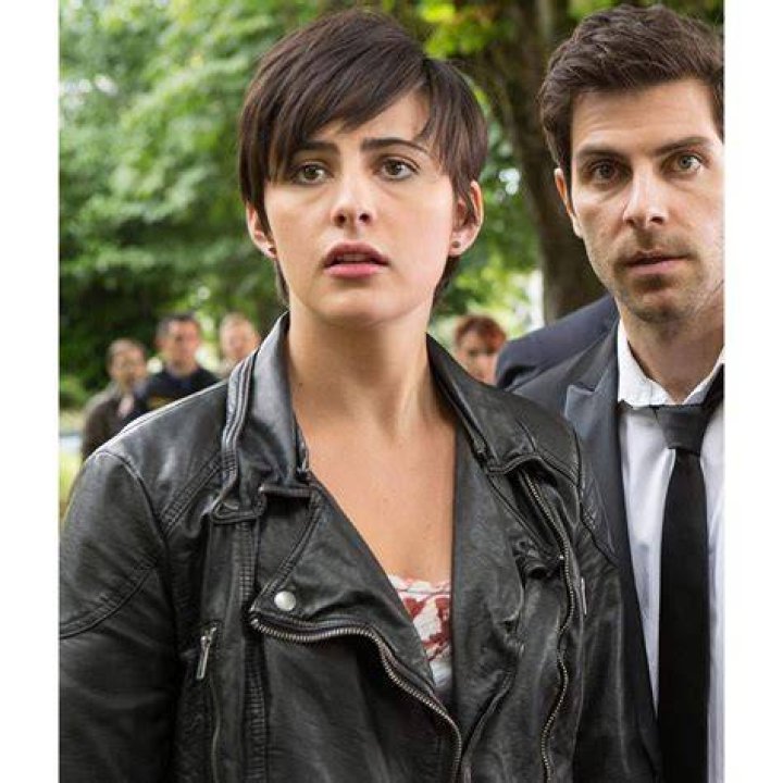 Jacqueline Toboni in a black coat.