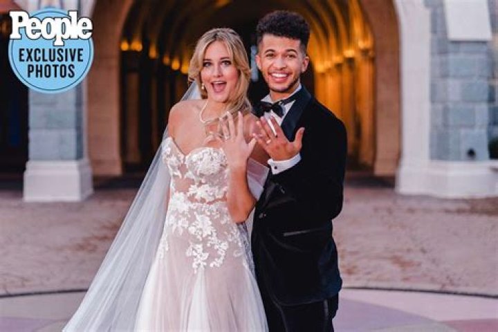 Jordan Fisher and Ellie Woods with their son Jordan Fisher and Ellie Woods with their son