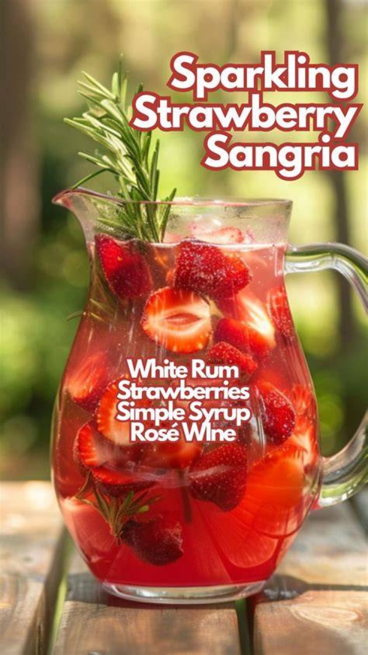 Strawberry sangria in a glass.