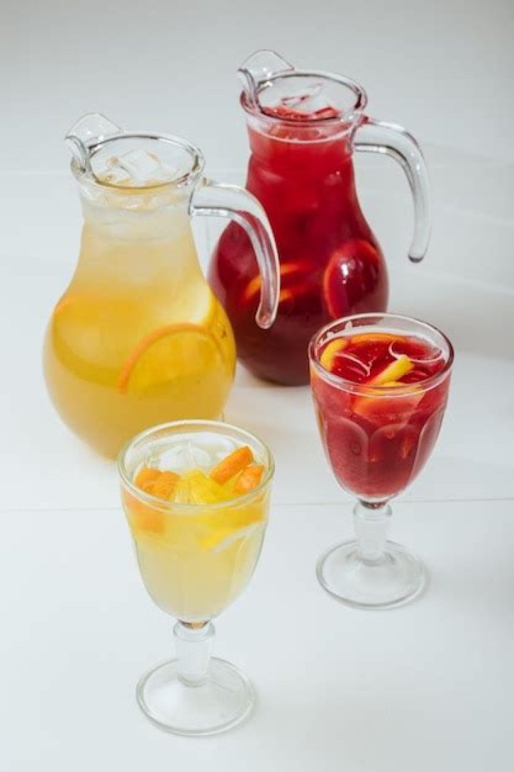 Three glasses of strawberry sangria.